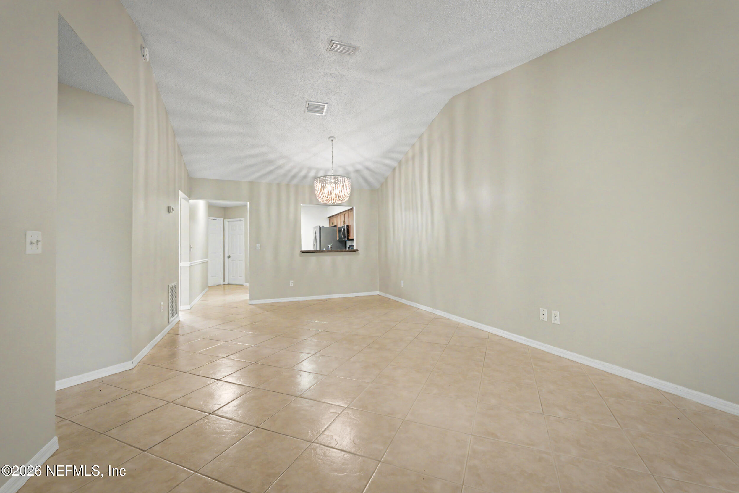 2811 Sea Hawk Drive Ponte Vedra Beach, FL 32082 - Photo 9 of 24 an empty room with a empty space and windows