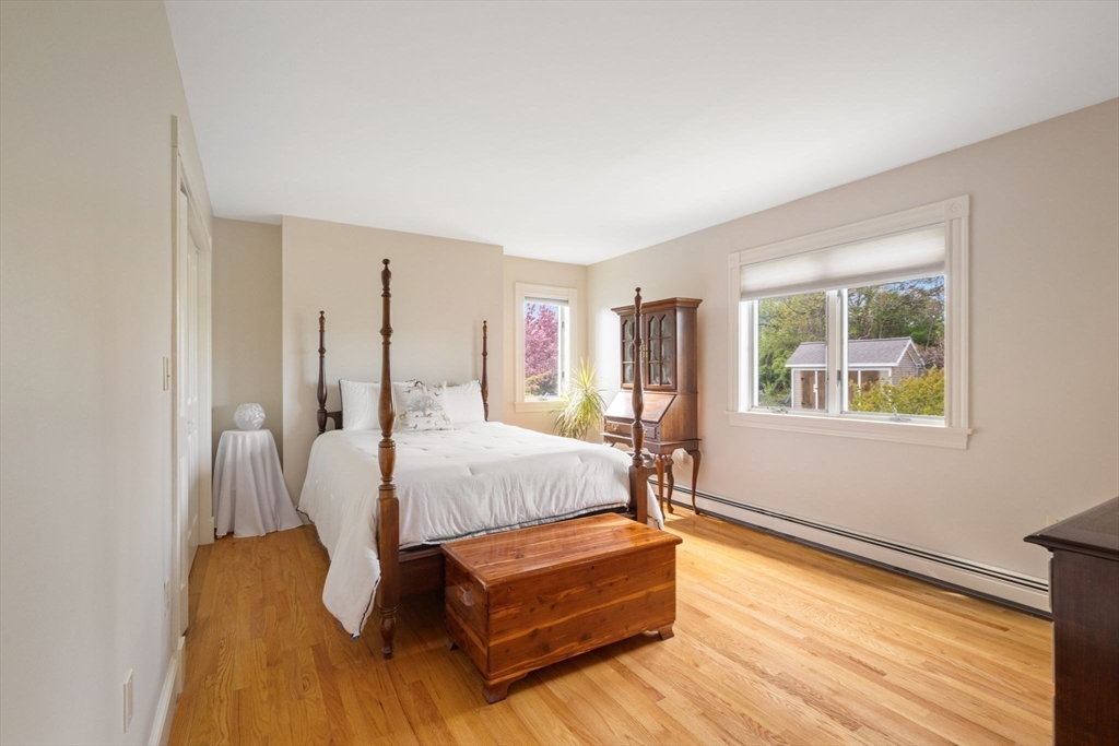 4 Harborview Road Hull, MA 02045 - Photo 21 of 38 a bed room with a bed and a window