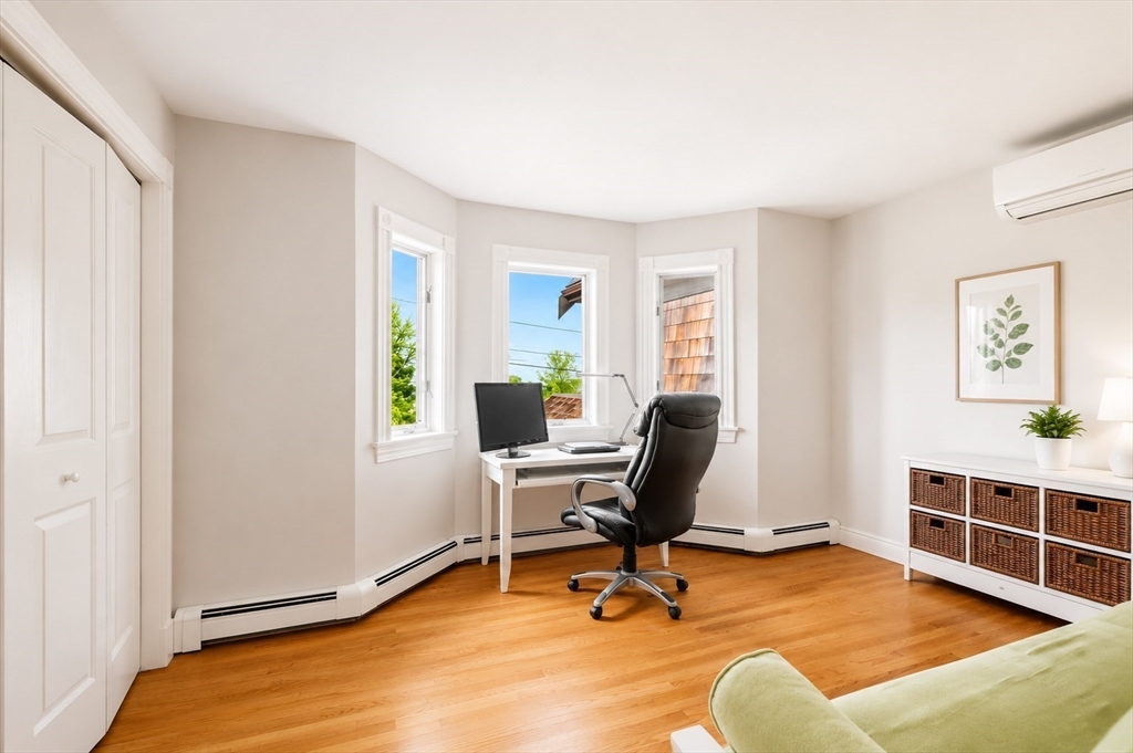 4 Harborview Road Hull, MA 02045 - Photo 22 of 38 a view of a workspace with furniture and a window