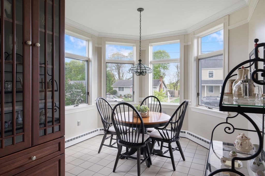 4 Harborview Road Hull, MA 02045 - Photo 8 of 38 a view of a dining room with furniture window and outside view