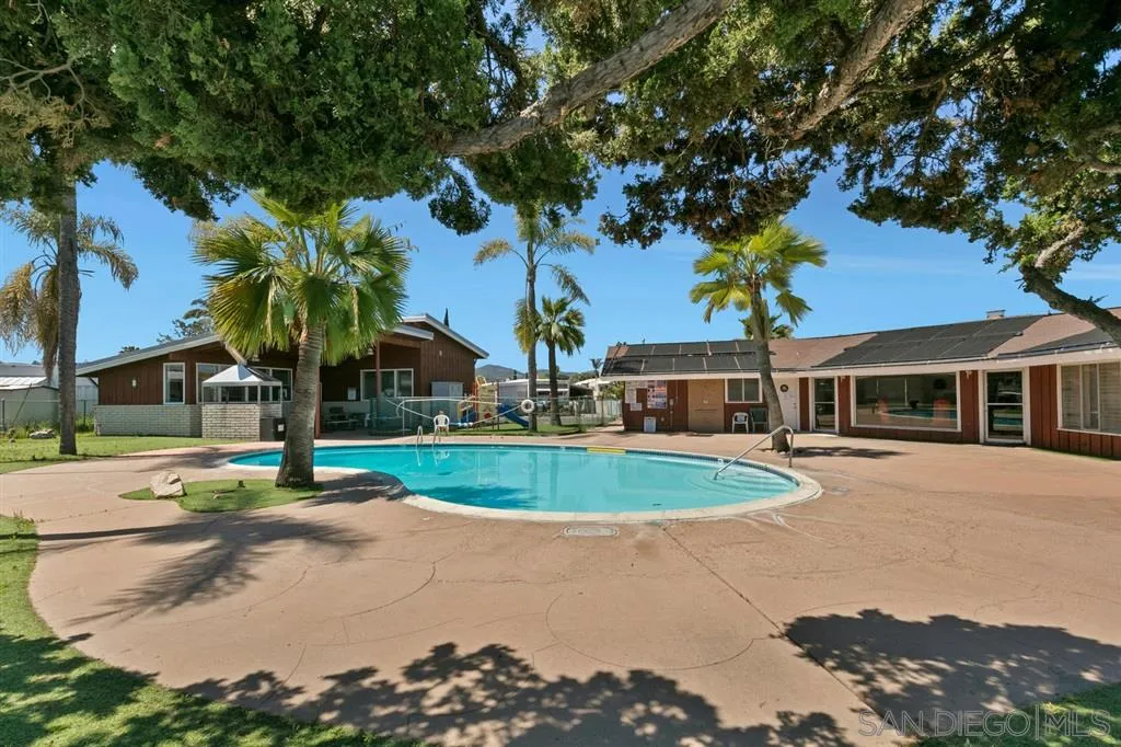 10250 Prospect Avenue, Unit 44 Santee, CA 92071 - Photo 16 of 17 a front view of a house with a yard