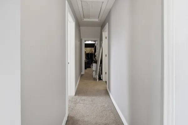 a bedroom with a bed and a flat tv screen