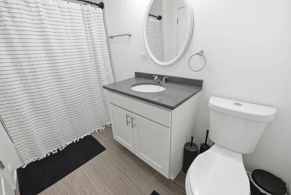 a bathroom with a sink and a toilet