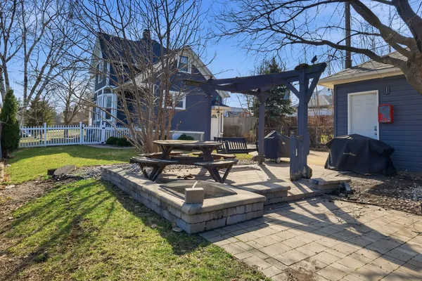 a view of entryway with wooden floor and stairs