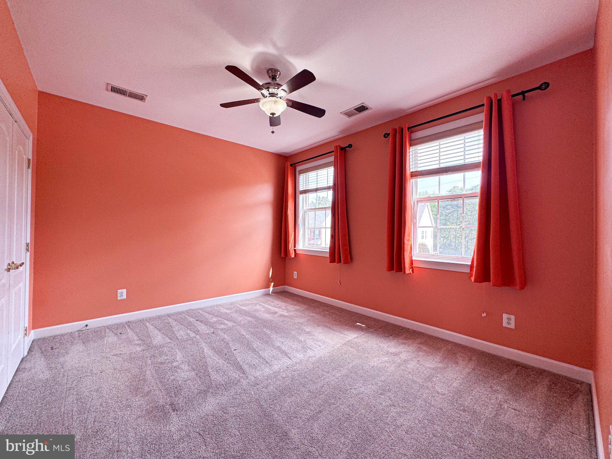 22827 Oakgrove Road Sterling, VA 20166 - Photo 17 of 56 Vibrant orange retreat with natural light.