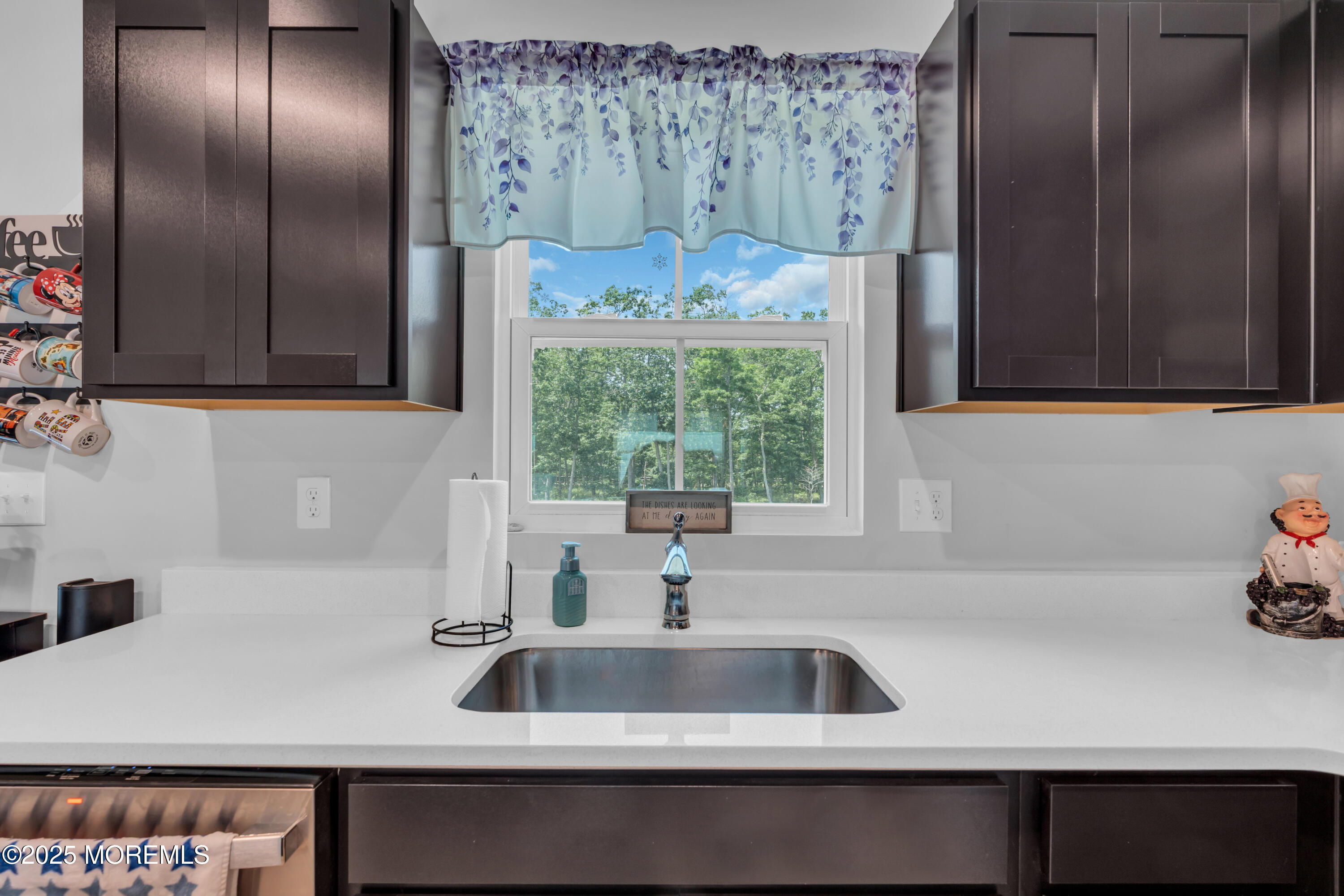 703 Cypress Street Forked River, NJ 08731 - Photo 13 of 50 a kitchen with a sink and cabinets