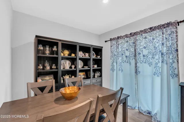 a kitchen with stainless steel appliances a sink stove top oven and cabinets