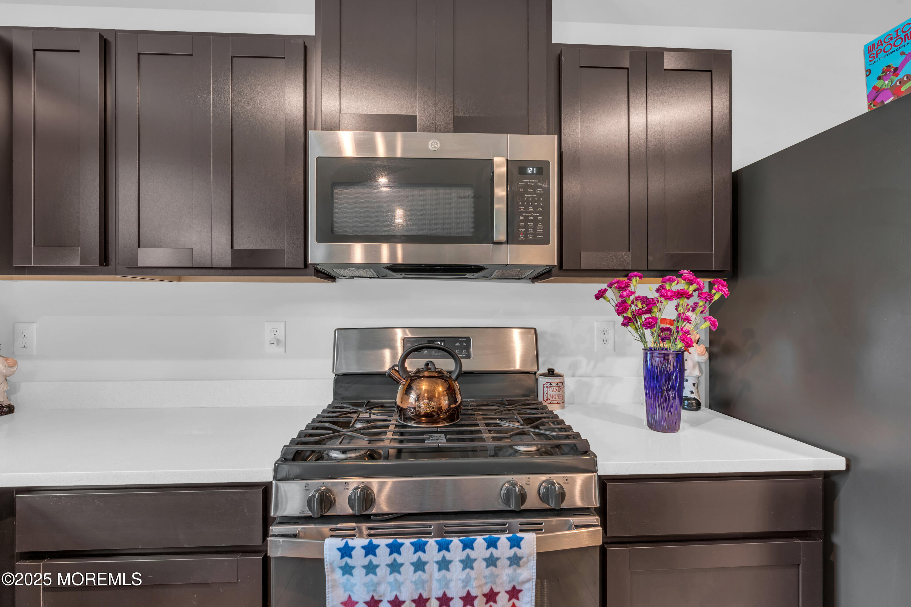 703 Cypress Street Forked River, NJ 08731 - Photo 16 of 50 a stove top oven sitting inside of a kitchen