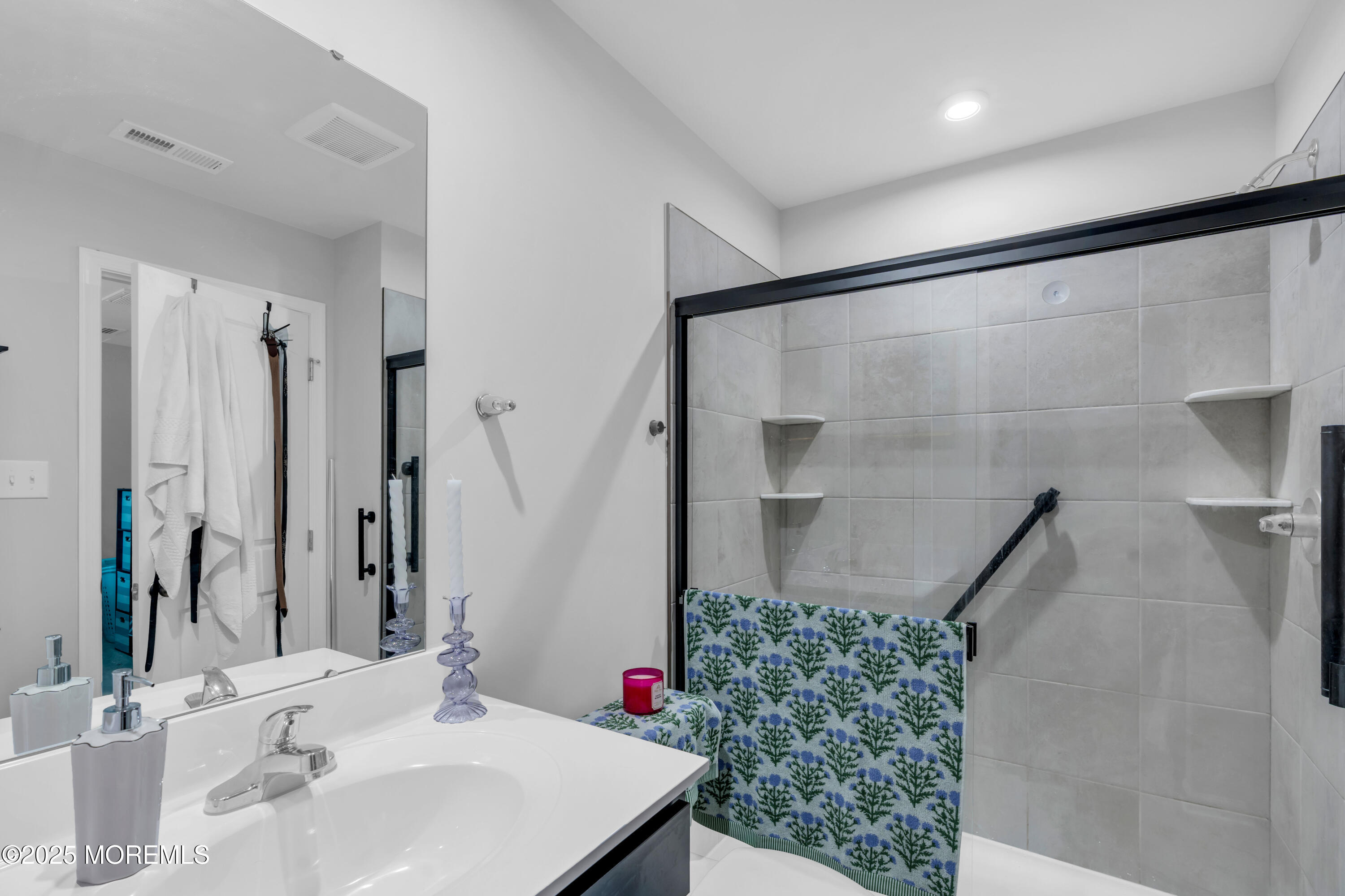 703 Cypress Street Forked River, NJ 08731 - Photo 25 of 50 a bathroom with a sink and a mirror