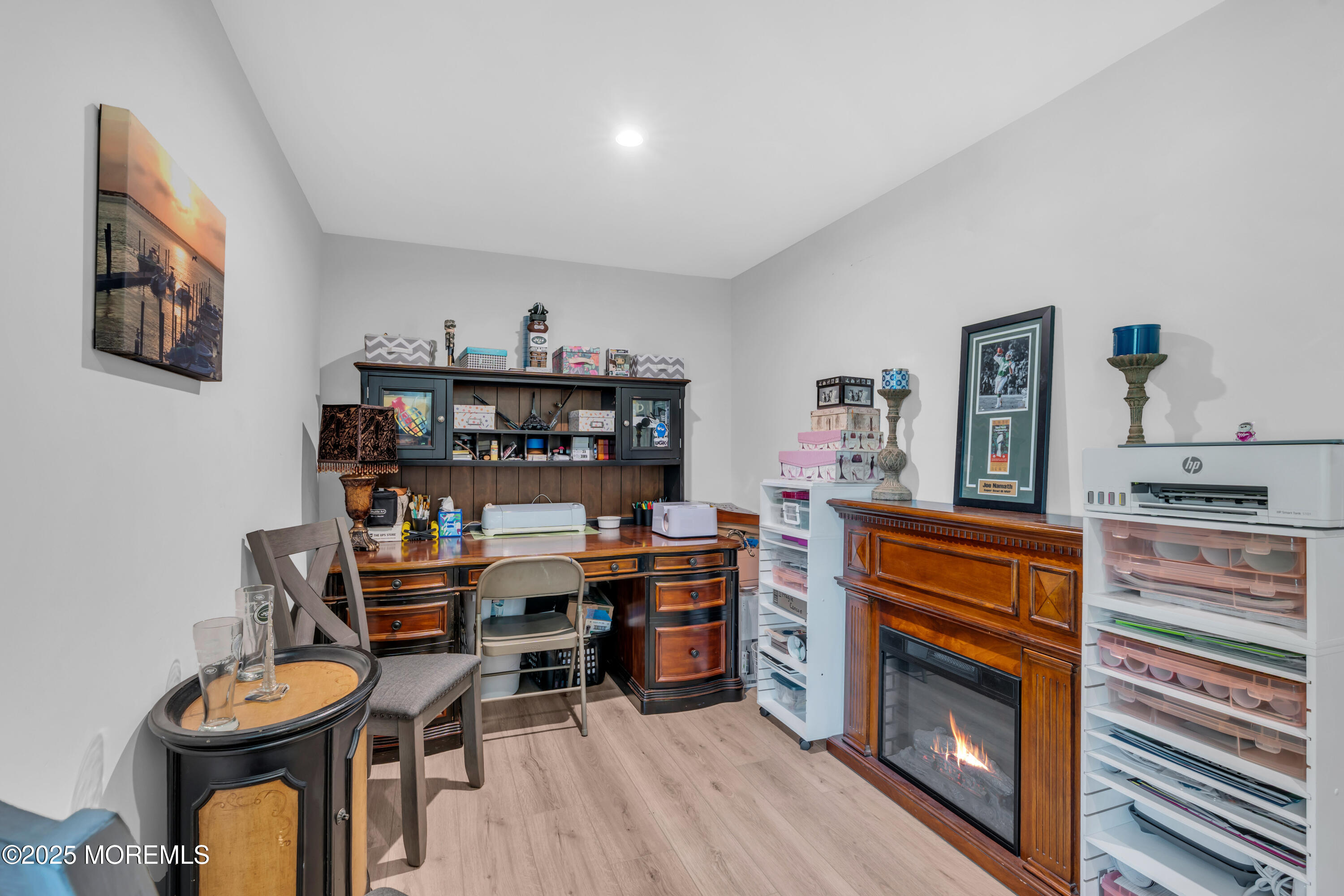 703 Cypress Street Forked River, NJ 08731 - Photo 6 of 50 a kitchen with stainless steel appliances a stove a table and chairs
