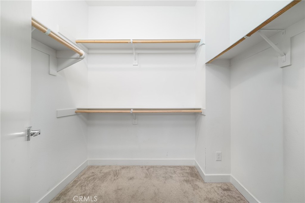 1602 West Bushell Street Anaheim, CA 92805 - Photo 22 of 31 a view of an empty walk in closet
