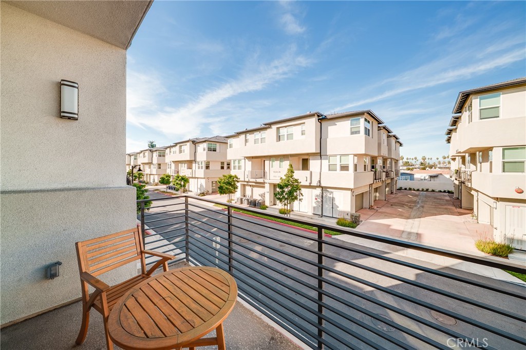 1602 West Bushell Street Anaheim, CA 92805 - Photo 29 of 31 a view of a chairs and table in a balcony