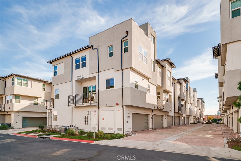 1602 West Bushell Street Anaheim, CA 92805 - Photo 4 of 31 a view of a street with buildings