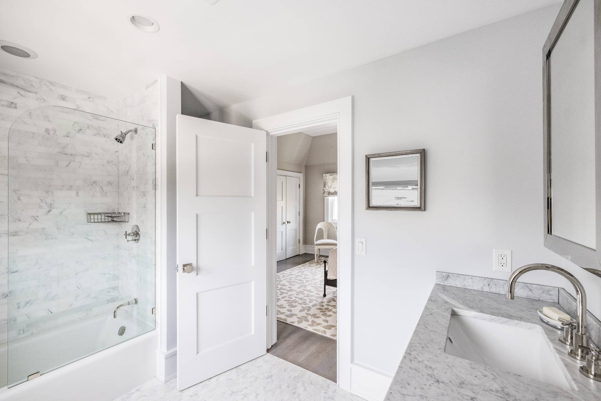 135 Hildreth Lane Bridgehampton, NY 11932 - Photo 19 of 33 a bathroom with a granite countertop tub sink and mirror