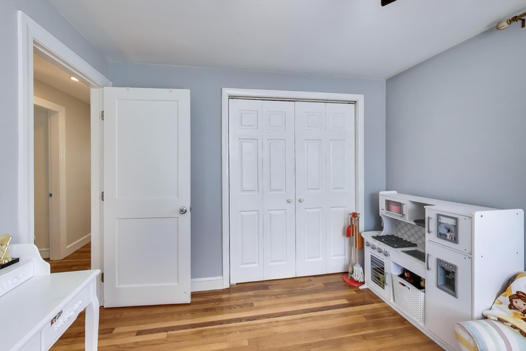 76 Dale Street Boston, MA 02131 - Photo 17 of 29 a view of an empty room and wooden floor