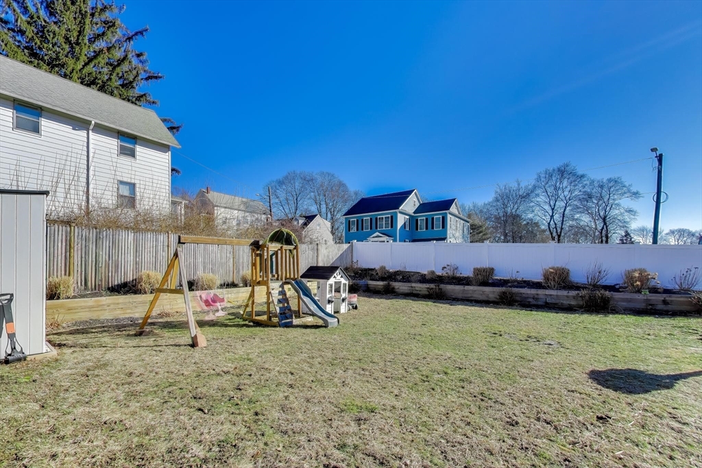 76 Dale Street Boston, MA 02131 - Photo 26 of 29 a view of a house with backyard