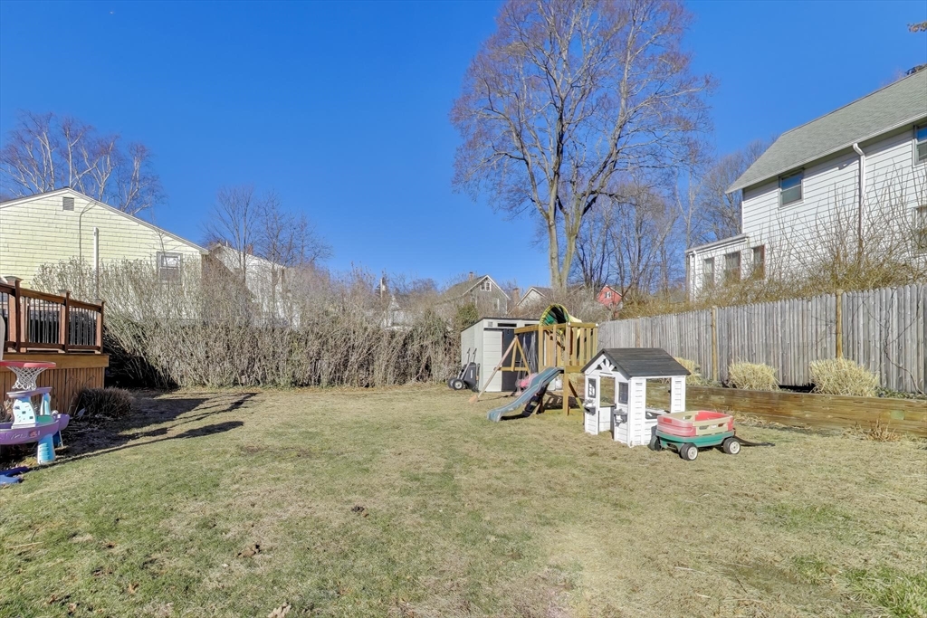 76 Dale Street Boston, MA 02131 - Photo 27 of 29 a view of backyard with tall trees