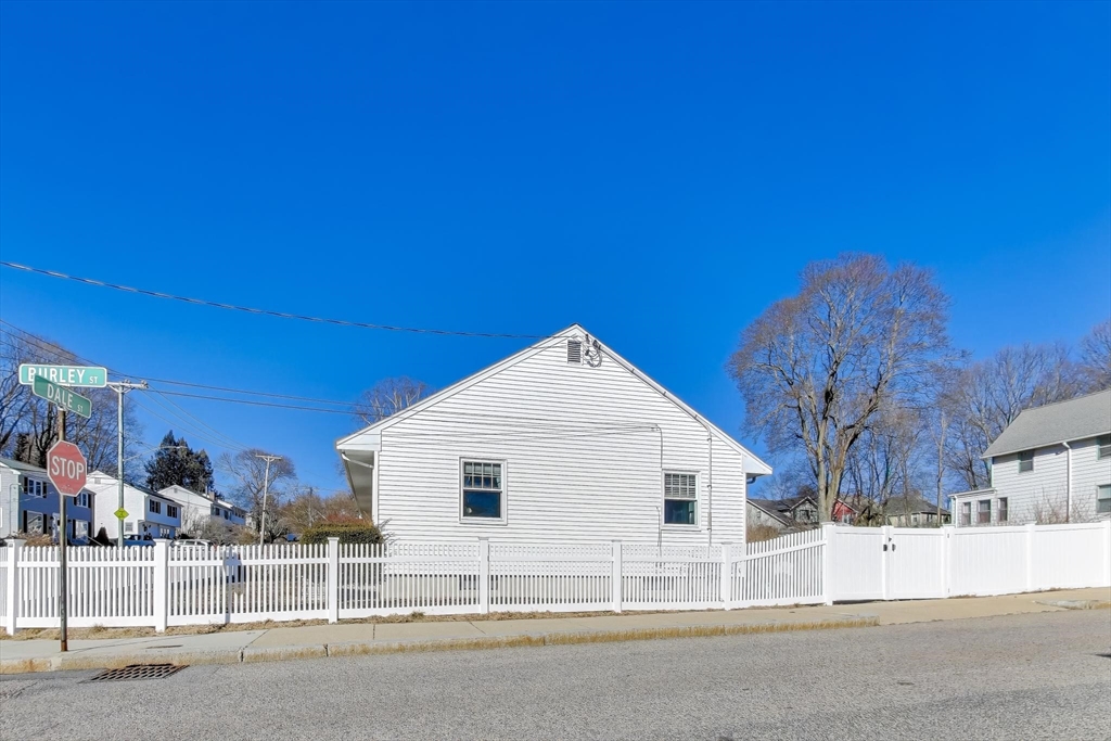 76 Dale Street Boston, MA 02131 - Photo 28 of 29 a view of a house with a backyard