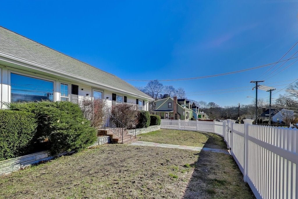 76 Dale Street Boston, MA 02131 - Photo 6 of 29 a view of a house with backyard and porch