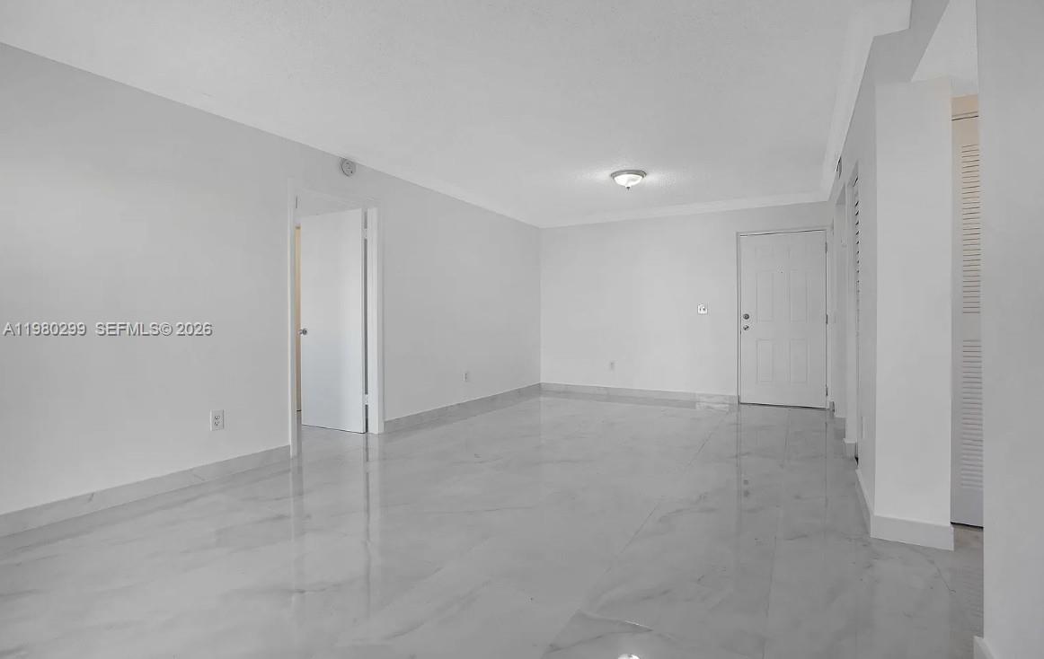 8260 Southwest 210th Street, Unit 302 Cutler Bay, FL 33189 - Photo 16 of 42 a view of an empty room