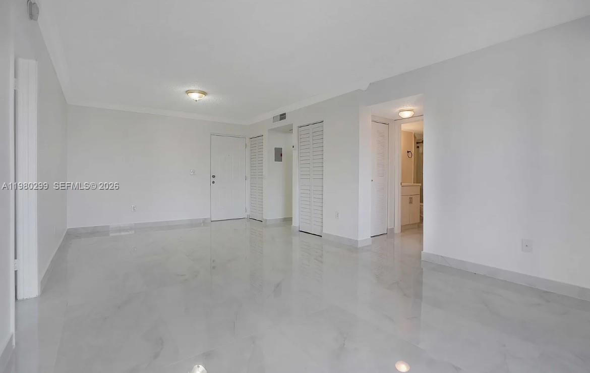 8260 Southwest 210th Street, Unit 302 Cutler Bay, FL 33189 - Photo 17 of 42 a view of an empty room