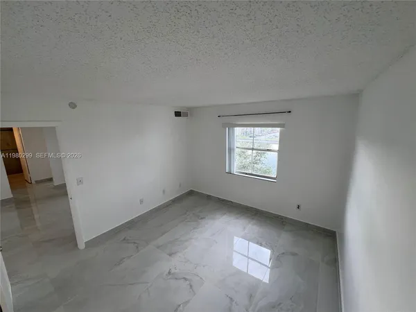 an empty room with a door