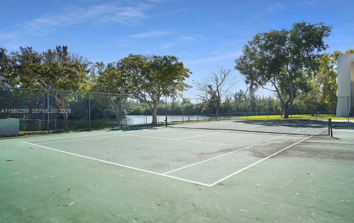 8260 Southwest 210th Street, Unit 302 Cutler Bay, FL 33189 - Photo 5 of 42 a view of a tennis court