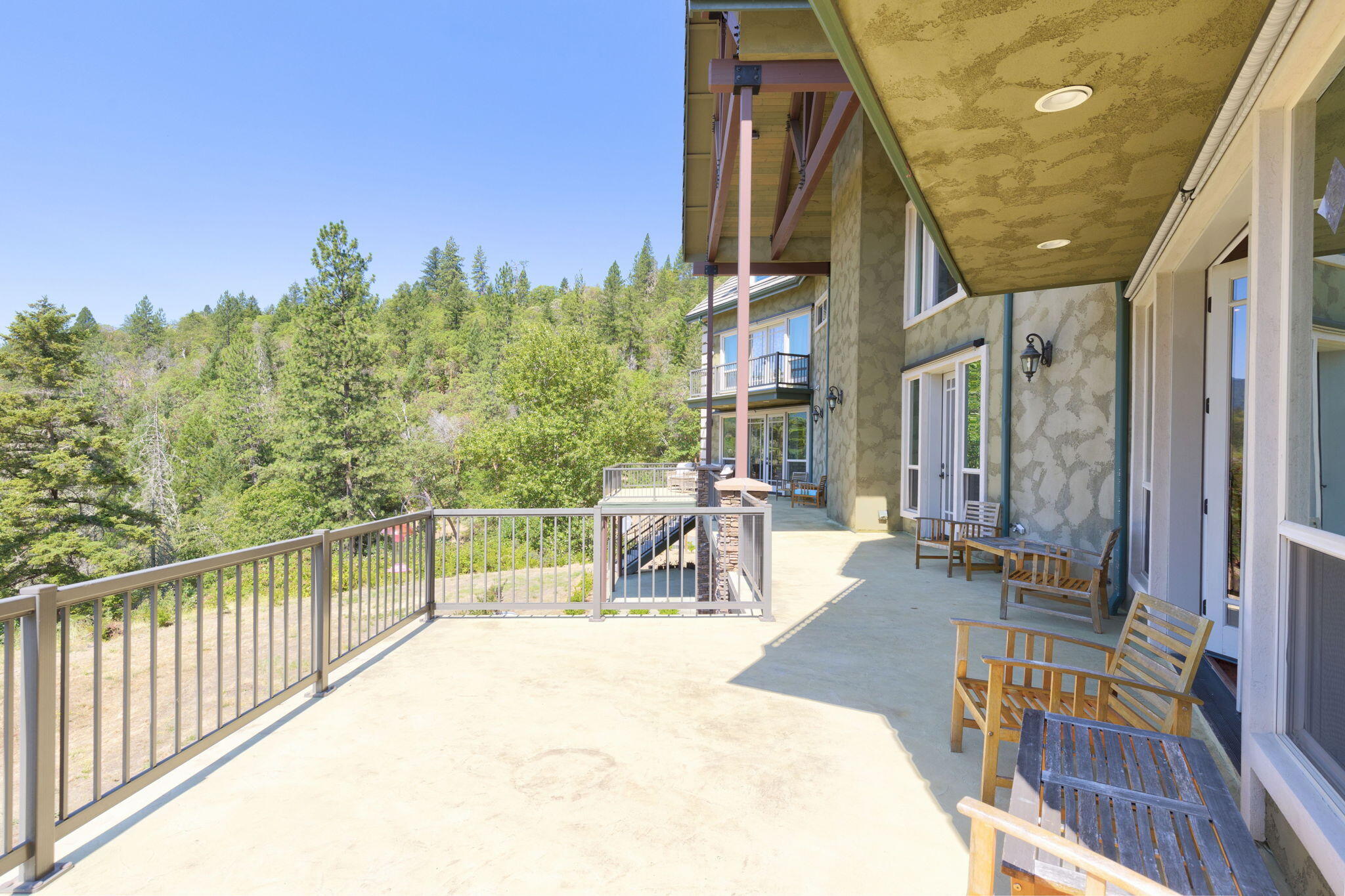 7304 North Applegate Road Grants Pass, OR 97527 - Photo 71 of 87 a view of a patio with iron fence