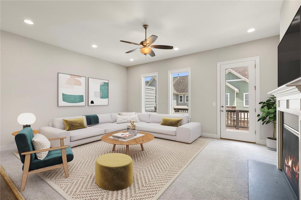 1954 Summit Trace Circle Northwest Atlanta, GA 30318 - Photo 1 of 1 a living room with furniture and a large window