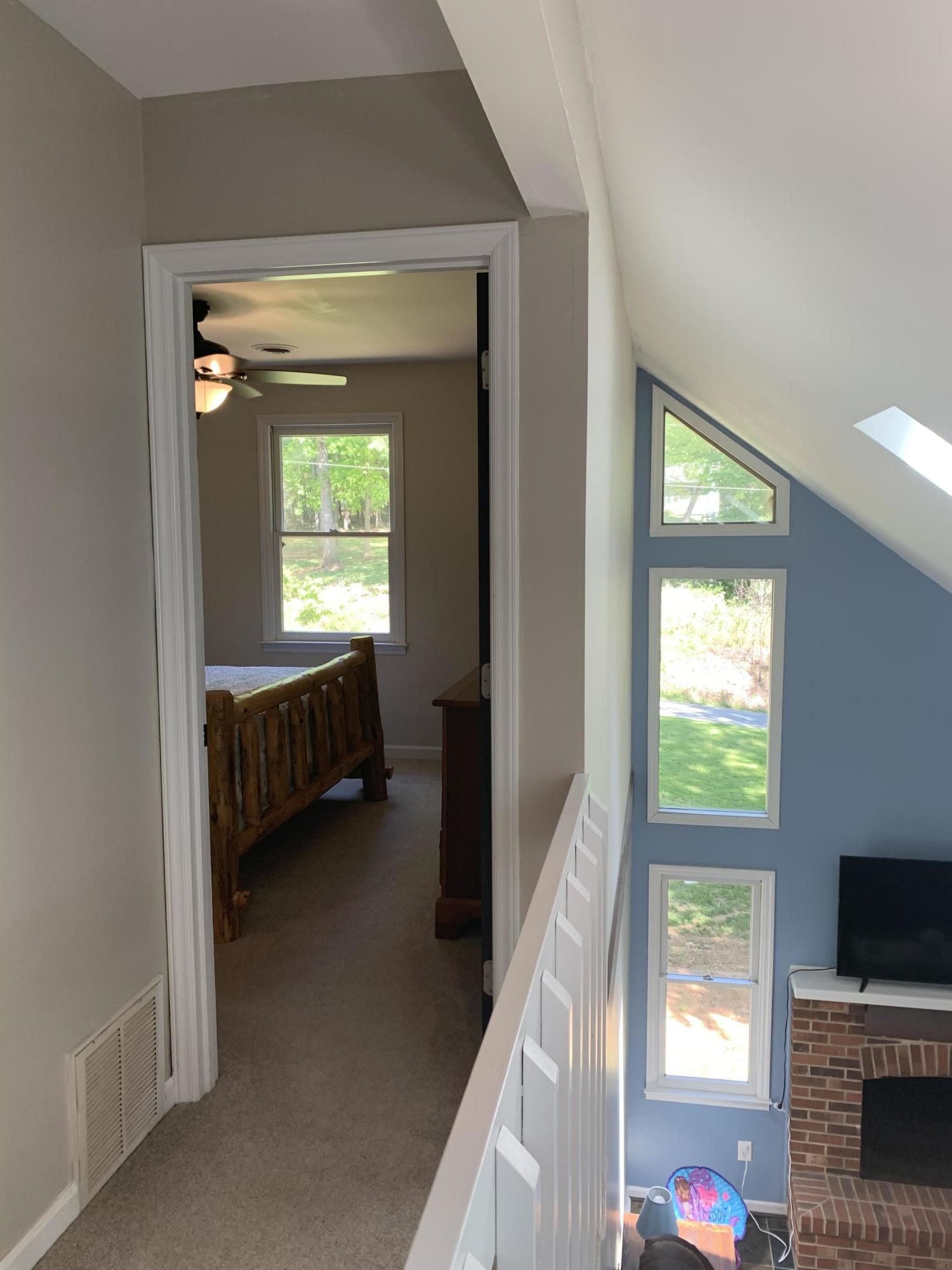 357 London Ridge Road Boones Mill, VA 24065 - Photo 15 of 28 a view of a room with a flat screen tv and windows
