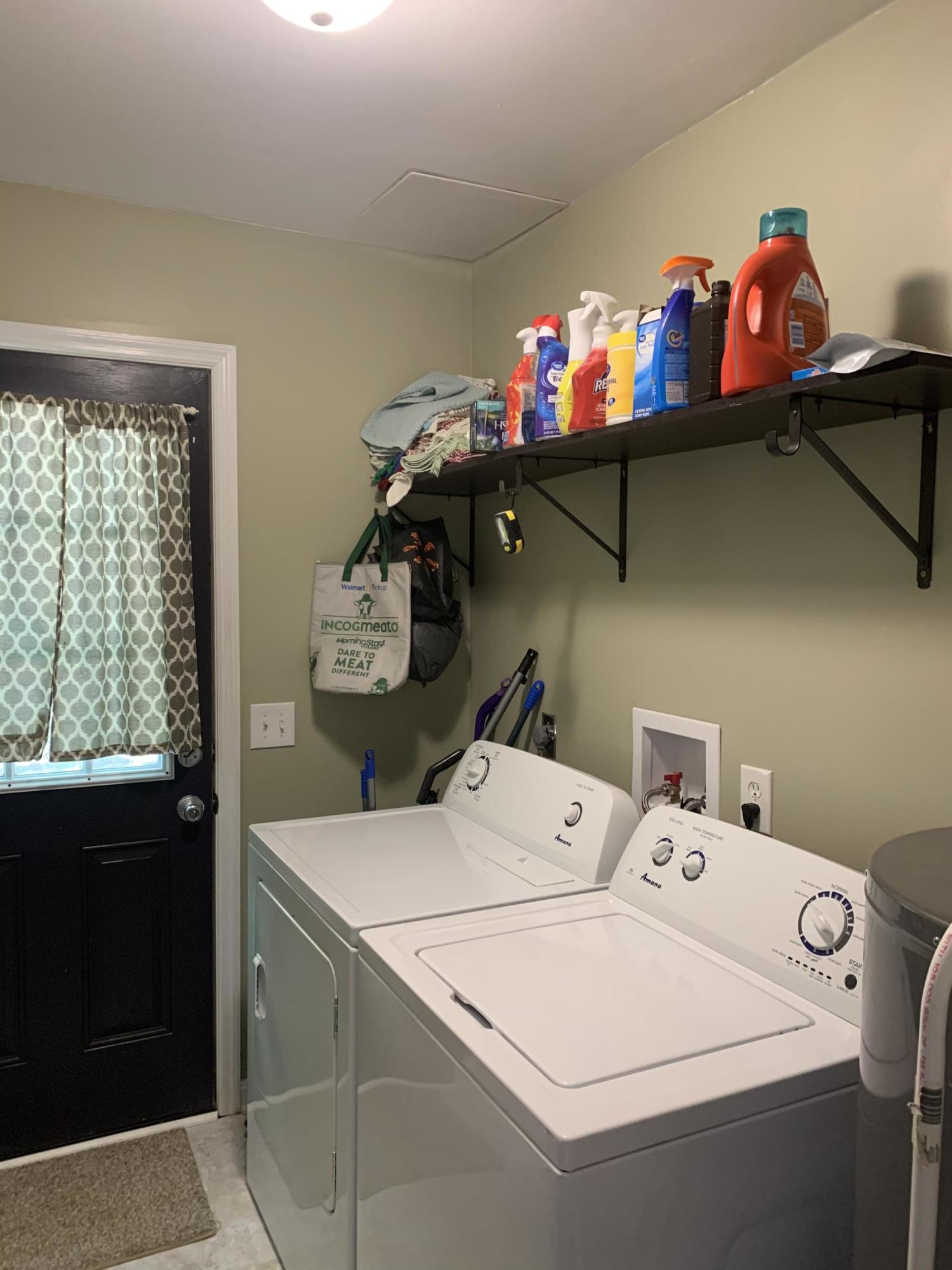 357 London Ridge Road Boones Mill, VA 24065 - Photo 8 of 28 a utility room with dryer washer and a view of living room