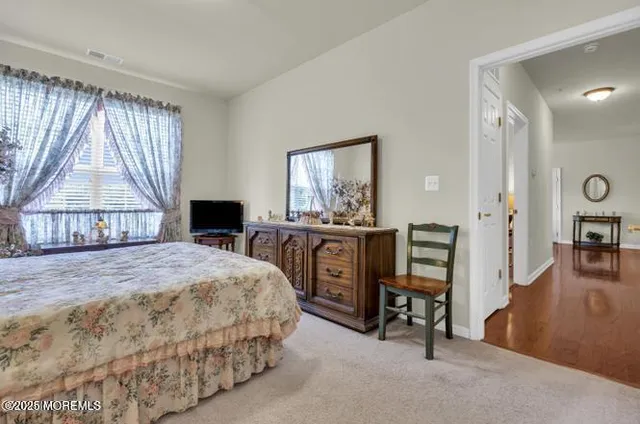 a view of a balcony with furniture