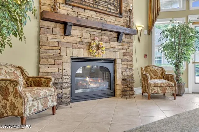 a large room with lots of furniture and lots of dining room