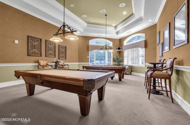 a media room with lots of chairs and a projector