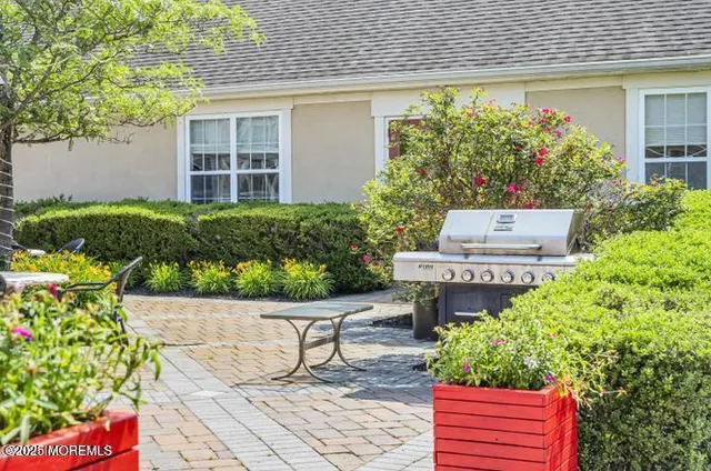 a car parked in front of a brick building