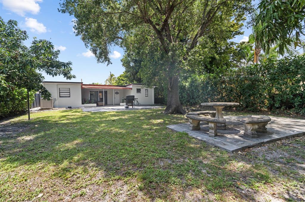 6375 Southwest 29th Street Miami, FL 33155 - Photo 13 of 51 a view of a house with backyard porch and sitting area
