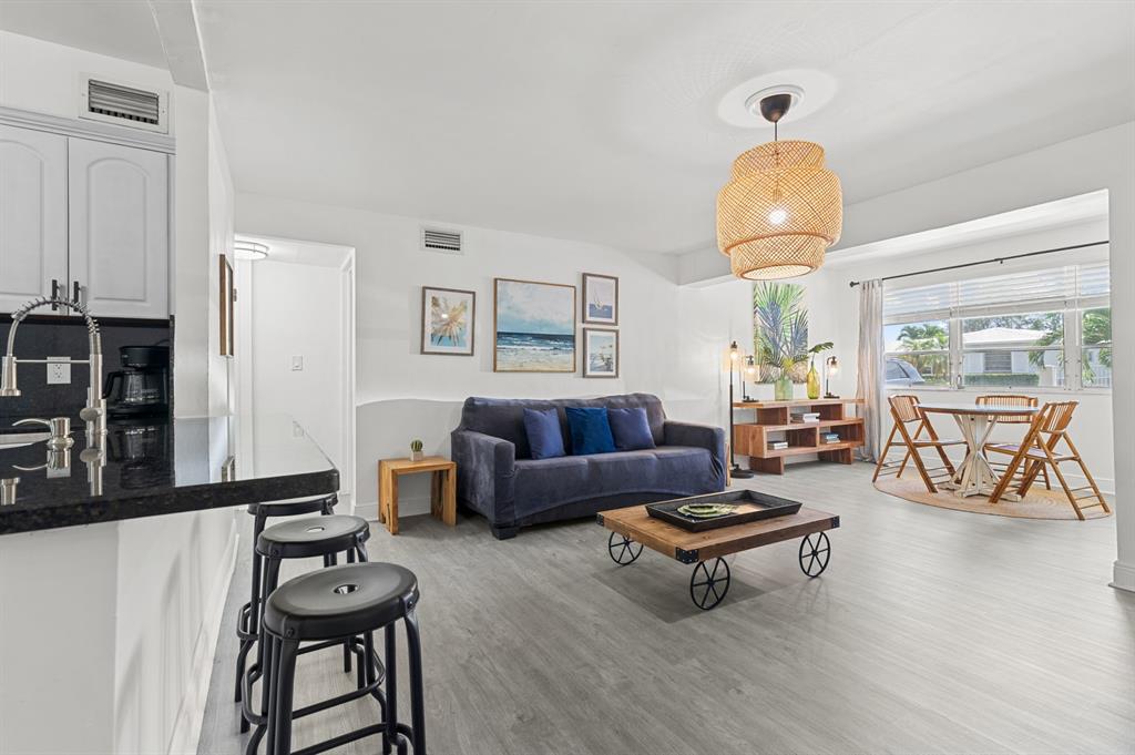 6375 Southwest 29th Street Miami, FL 33155 - Photo 20 of 51 a living room with furniture and a chandelier