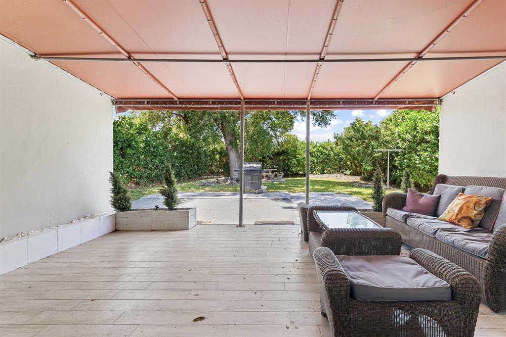 6375 Southwest 29th Street Miami, FL 33155 - Photo 25 of 51 a view of a patio with couches and pool