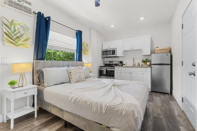 a bed room with a bed furniture and a window