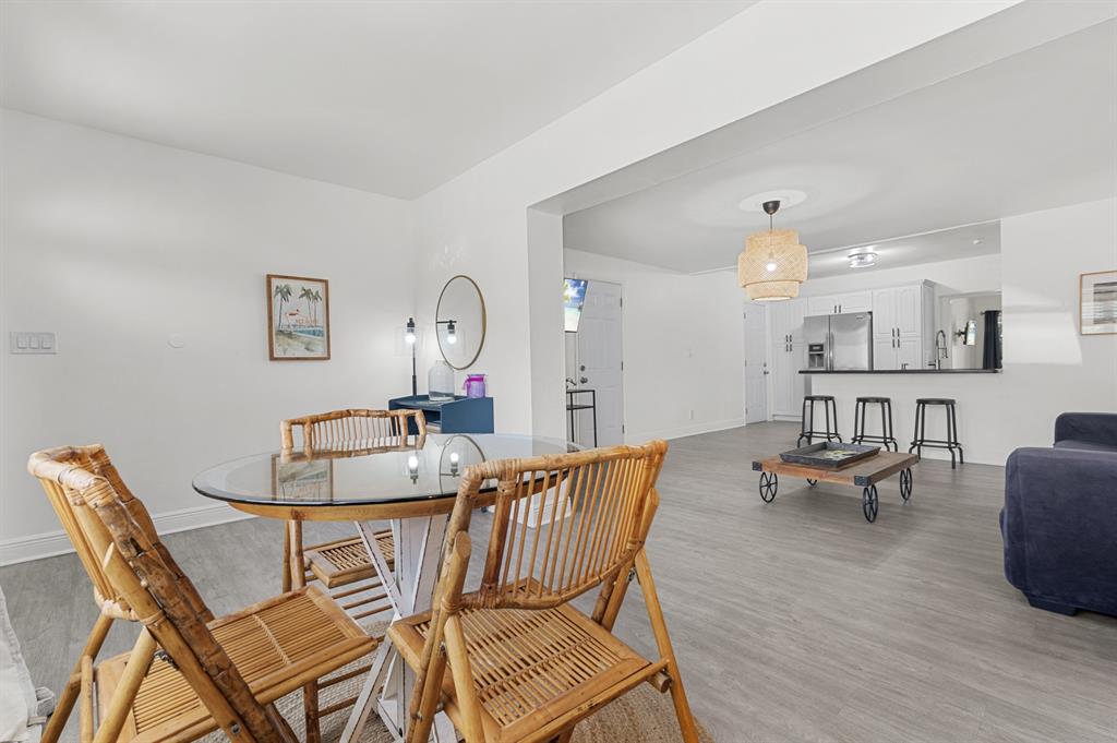 6375 Southwest 29th Street Miami, FL 33155 - Photo 3 of 51 a dining room with furniture and wooden floor