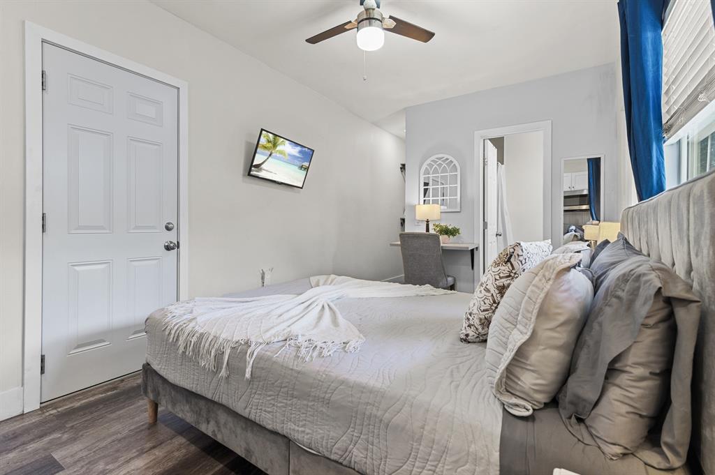 6375 Southwest 29th Street Miami, FL 33155 - Photo 31 of 51 a bedroom with a bed and a chandelier