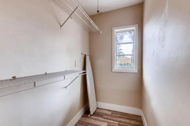 a bathroom with a toilet sink and shower