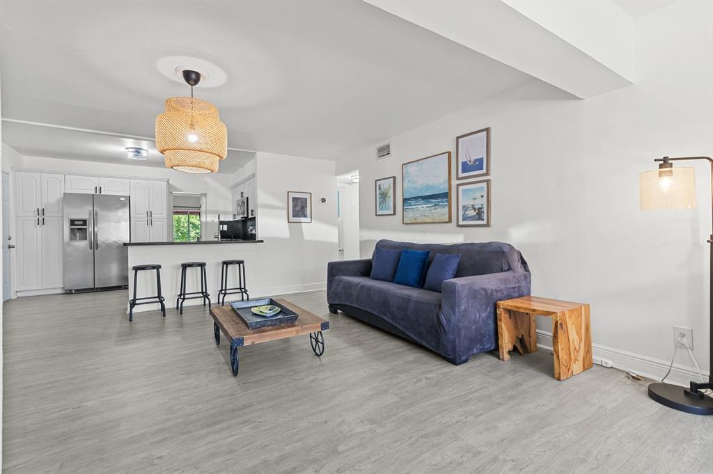 6375 Southwest 29th Street Miami, FL 33155 - Photo 5 of 51 a living room with furniture and a chandelier
