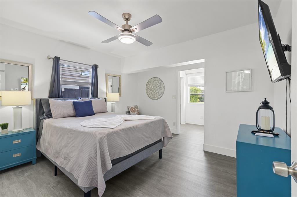 6375 Southwest 29th Street Miami, FL 33155 - Photo 6 of 51 a bedroom with a bed chandelier and a window