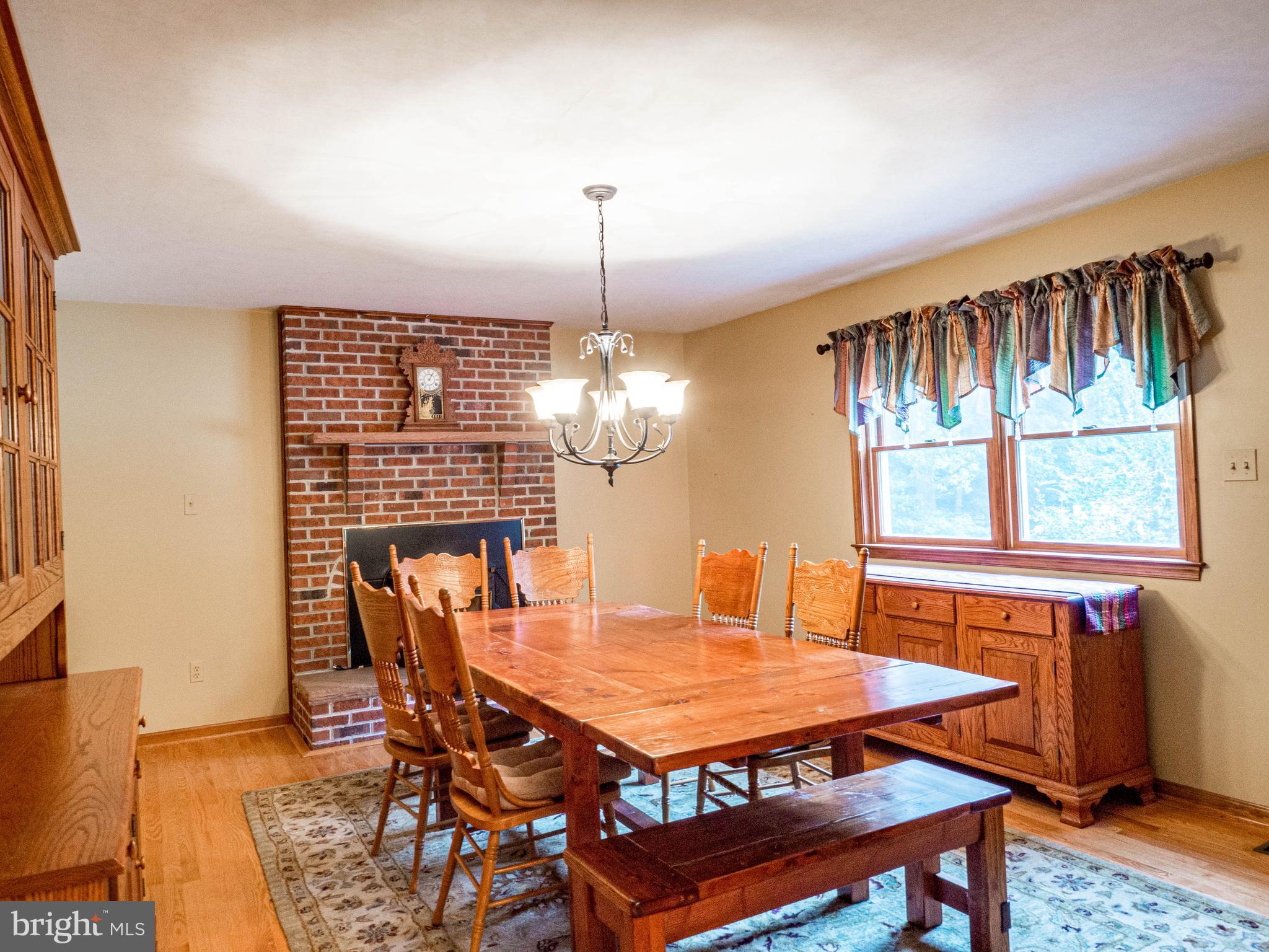 12003 Van Brady Road Upper Marlboro, MD 20772 - Photo 13 of 35 huge dining room with fireplace