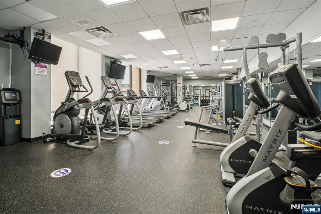 800 Palisade Avenue, Unit PH21A Fort Lee, NJ 07024 - Photo 42 of 50 a view of a room with gym equipment