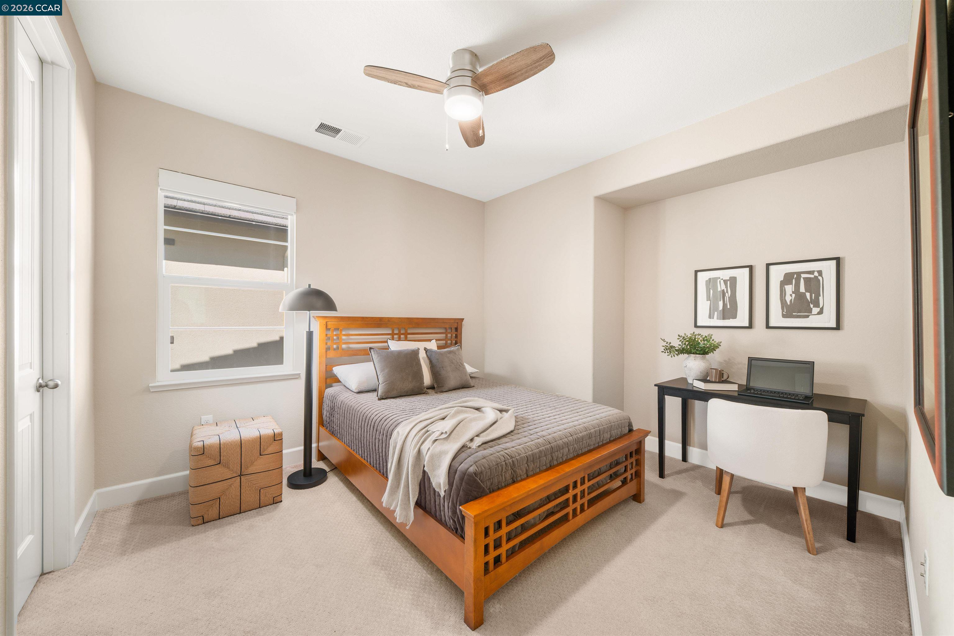 2026 Poinsettia Street San Ramon, CA 94582 - Photo 17 of 26 a bedroom with a bed and a table