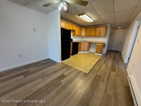 a view of a living room with a fireplace