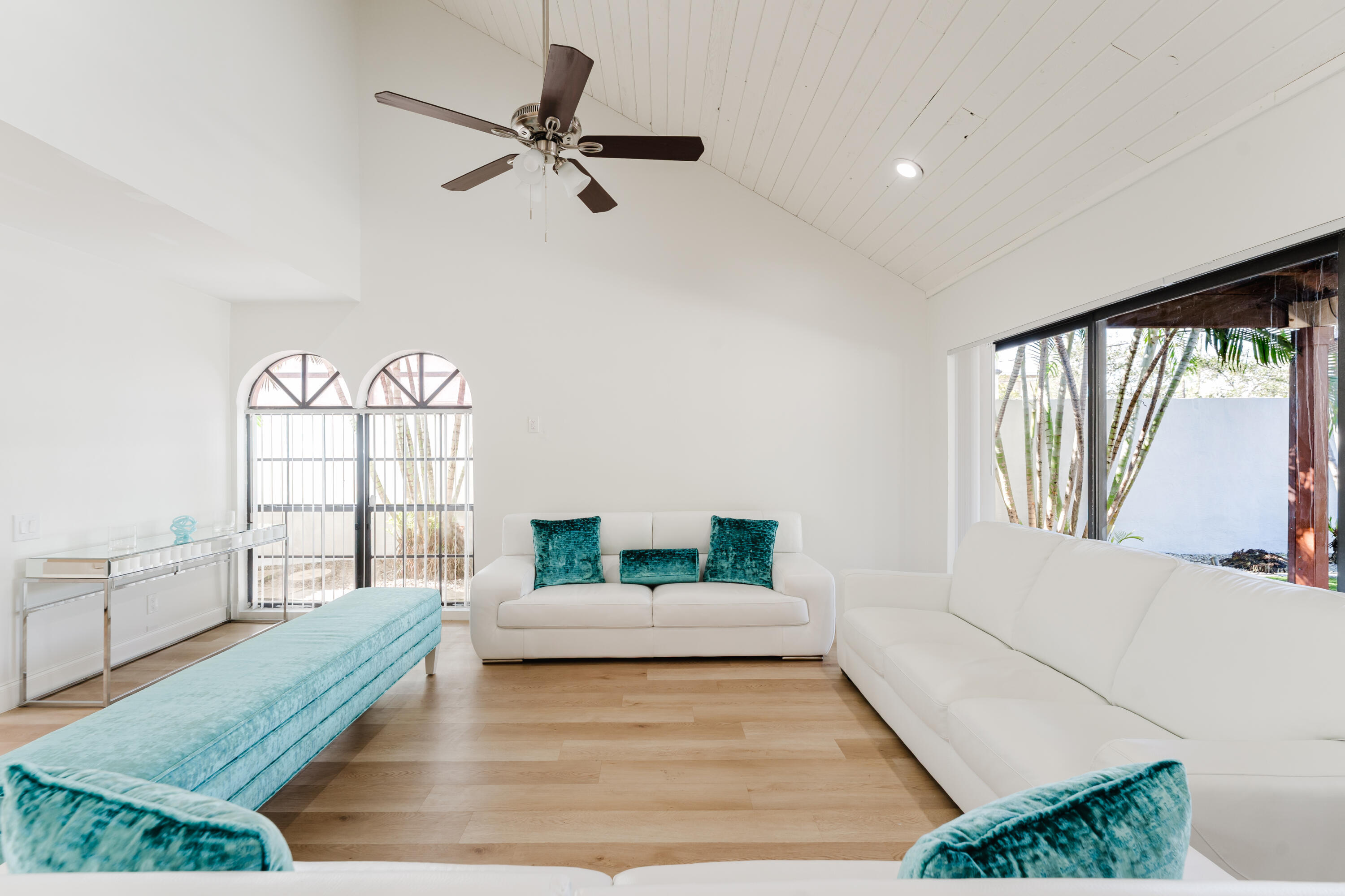 665 Jeffery Street Boca Raton, FL 33487 - Photo 13 of 44 a living room with furniture and a large window