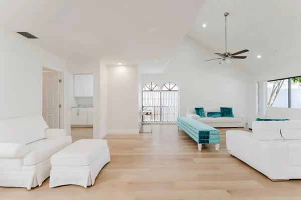 a living room with furniture and a window